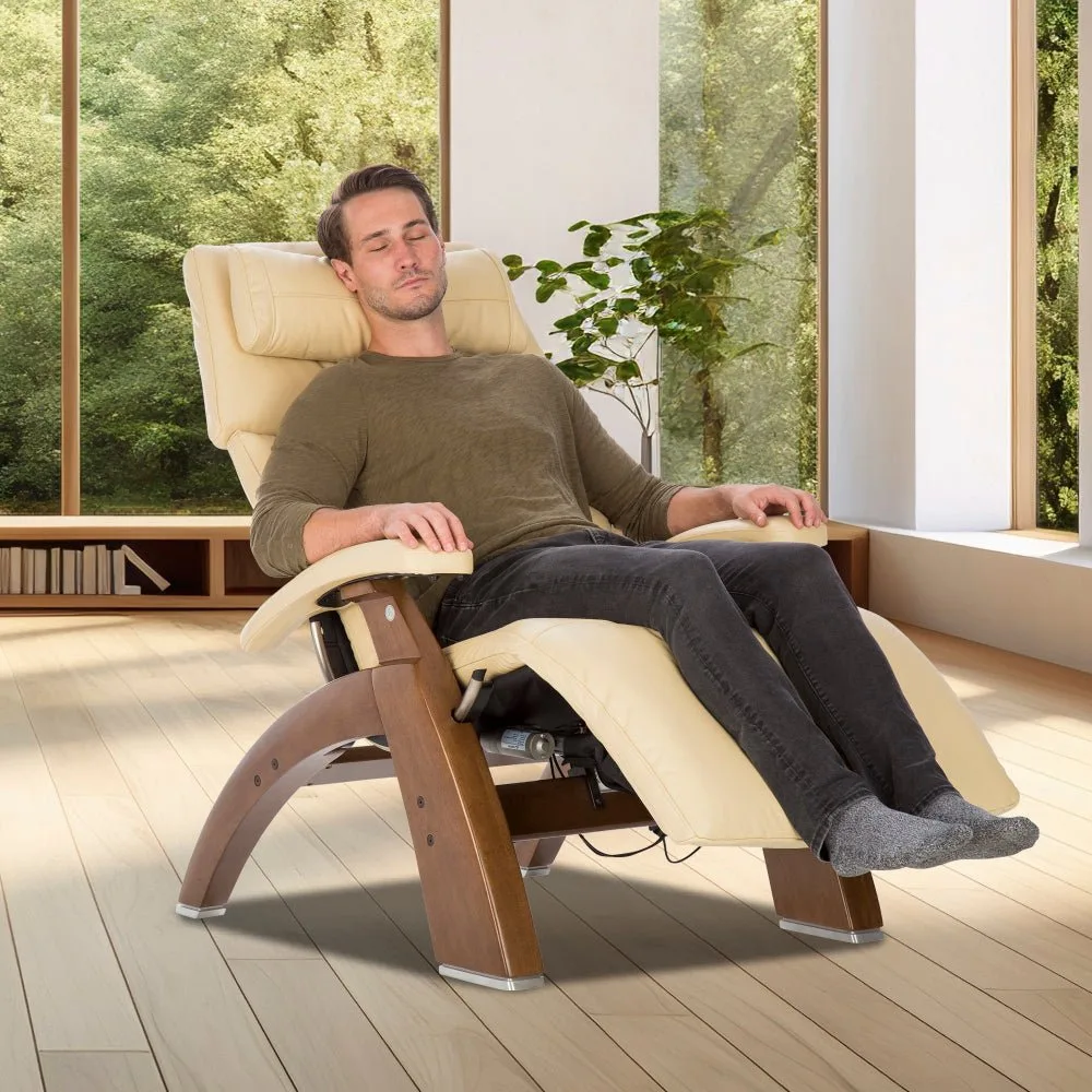 Human Touch Perfect Chair PC-610 in cream leather with a man reclining by a window
