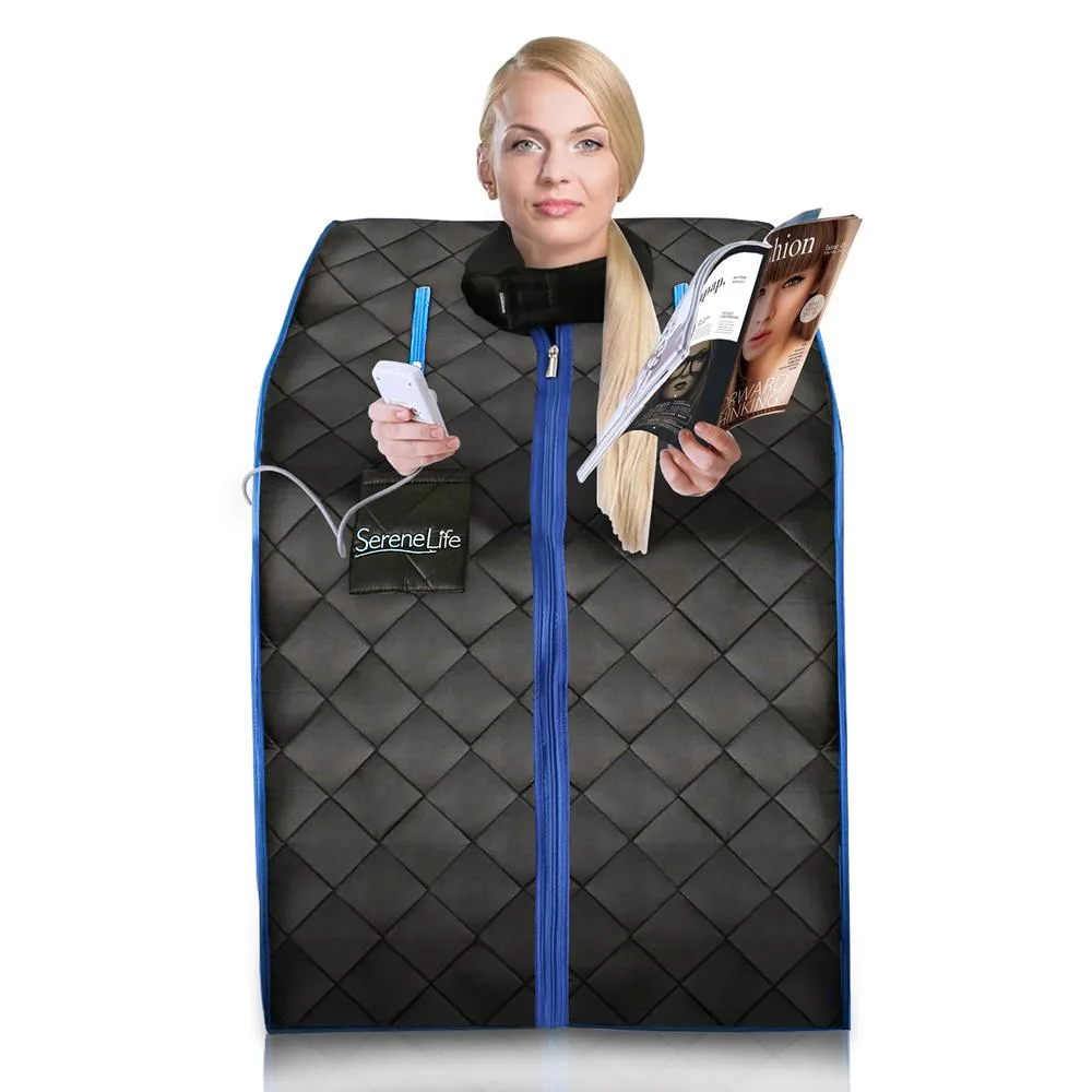 SereneLife portable infrared sauna tent in black with a woman seated inside reading